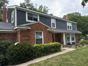 Brick house with siding